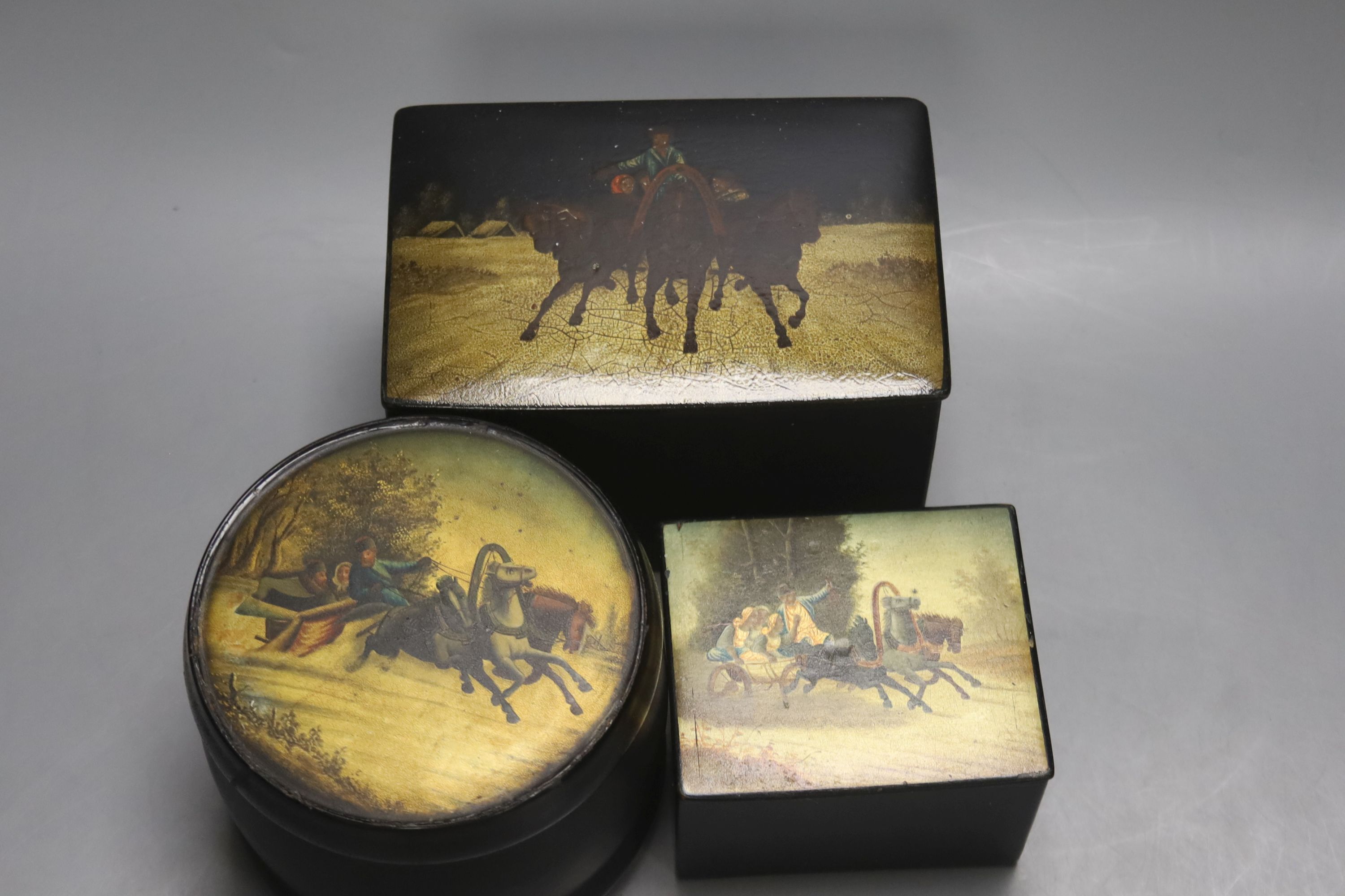Five Russian painted papier mache boxes, 19th century and later, largest 15 x 10cm 10cm high